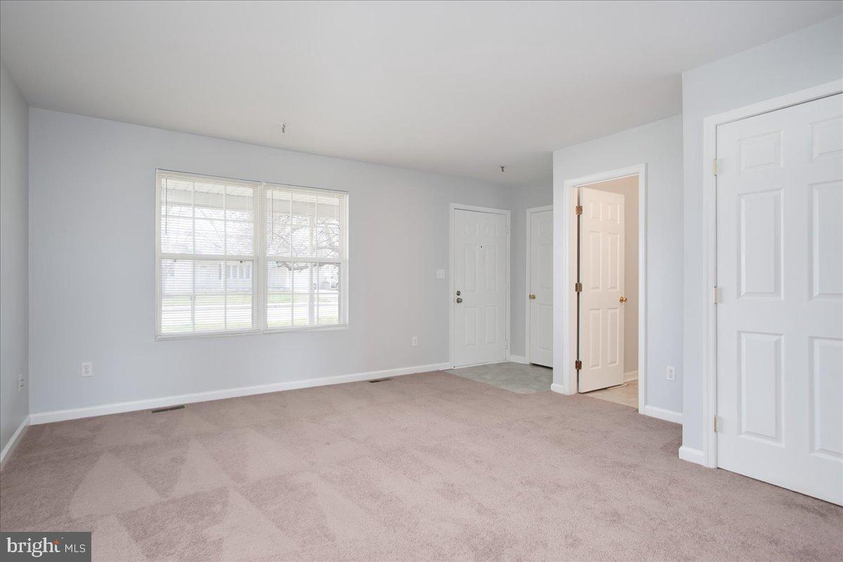 334 East Baltimore Street Taneytown, MD 21787 - Photo 3 of 31 a view of an empty room with a window