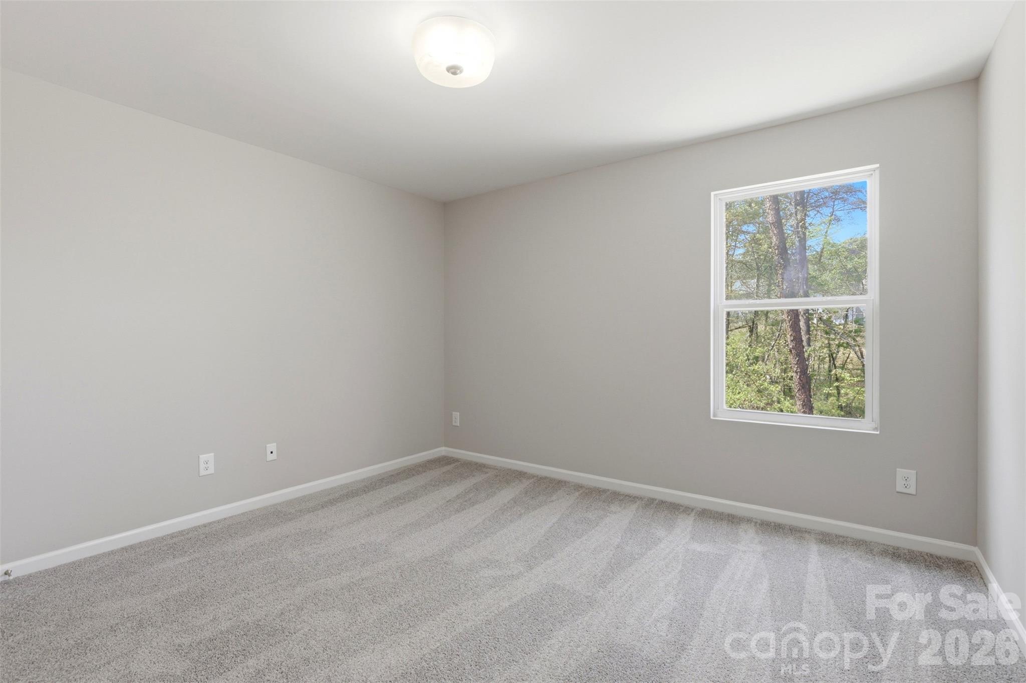 1117 Streamside Lane York, SC 29745 - Photo 14 of 25 an empty room with a window