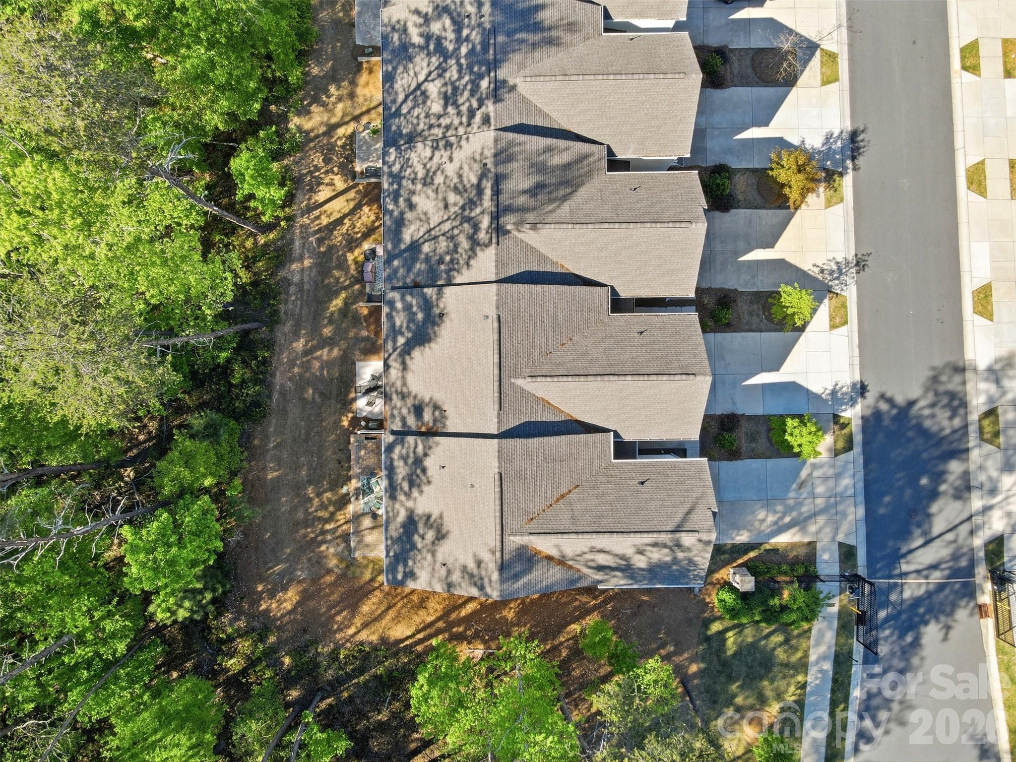 1117 Streamside Lane York, SC 29745 - Photo 20 of 25 an aerial view of a house with a yard and trees