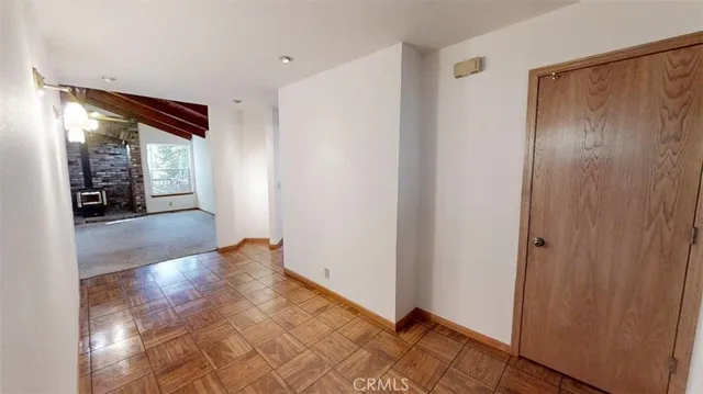 a kitchen with stainless steel appliances granite countertop a sink a stove and cabinets