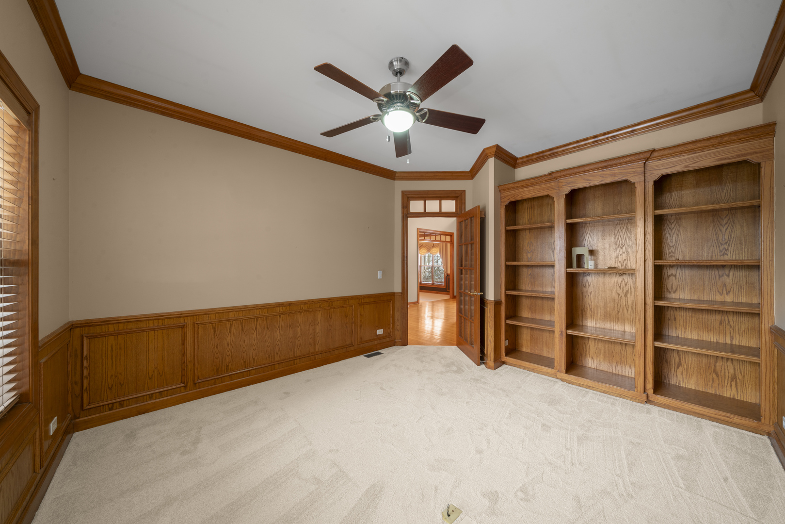 757 Merrill New Road Sugar Grove, IL 60554 - Photo 22 of 51 a view of an empty room with a ceiling fan