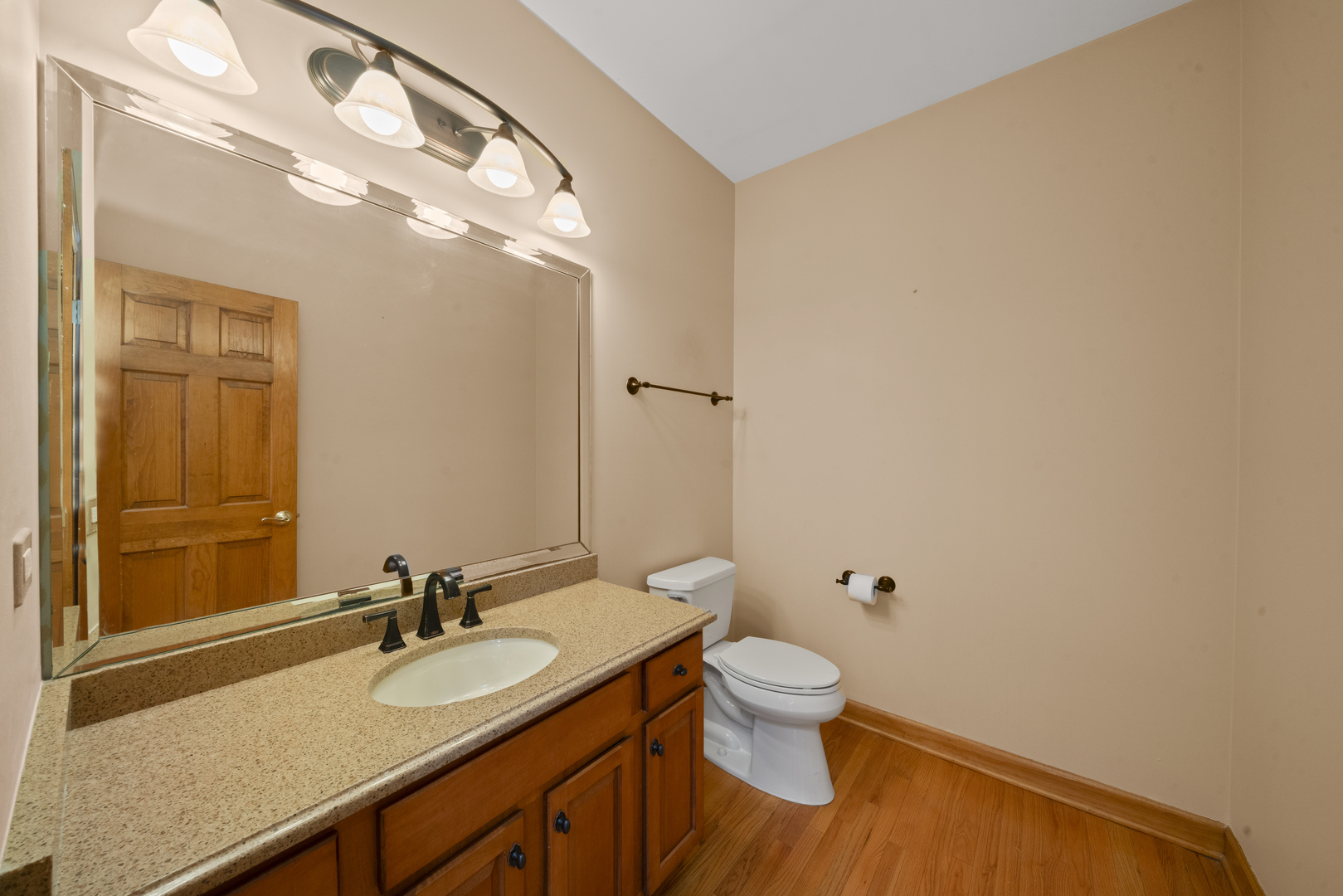 757 Merrill New Road Sugar Grove, IL 60554 - Photo 23 of 51 a bathroom with a granite countertop sink mirror vanity and toilet