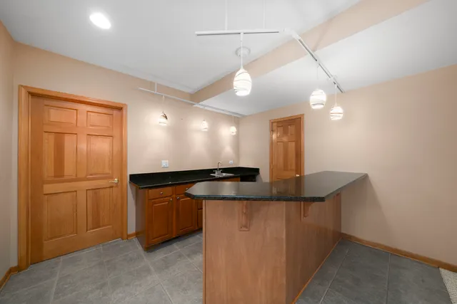 a view of swimming pool that has a couch