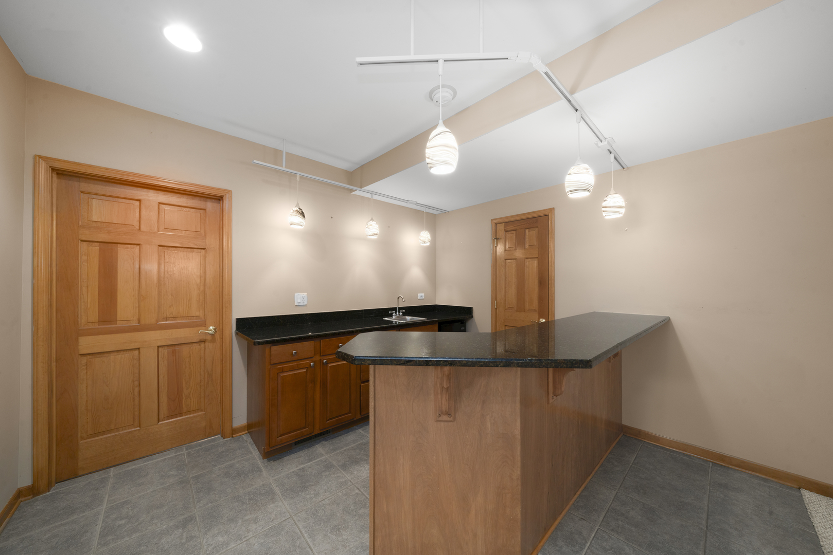 757 Merrill New Road Sugar Grove, IL 60554 - Photo 39 of 51 a kitchen with stainless steel appliances granite countertop a sink a refrigerator and a stove