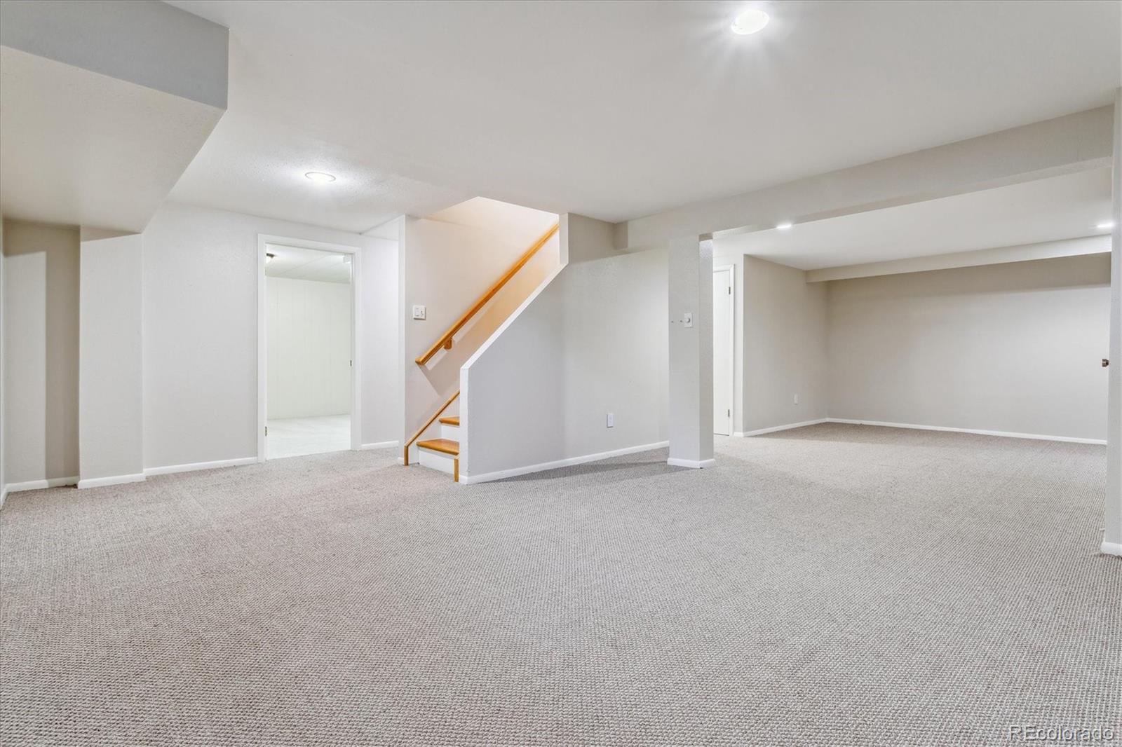 1975 South Locust Street Denver, CO 80224 - Photo 30 of 40 a view of an empty room with stairs
