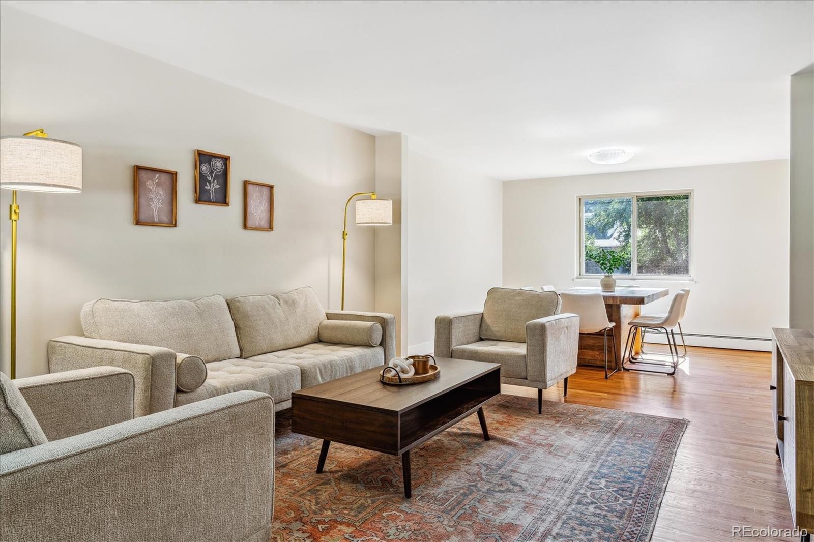 1975 South Locust Street Denver, CO 80224 - Photo 9 of 40 a living room with furniture and a table