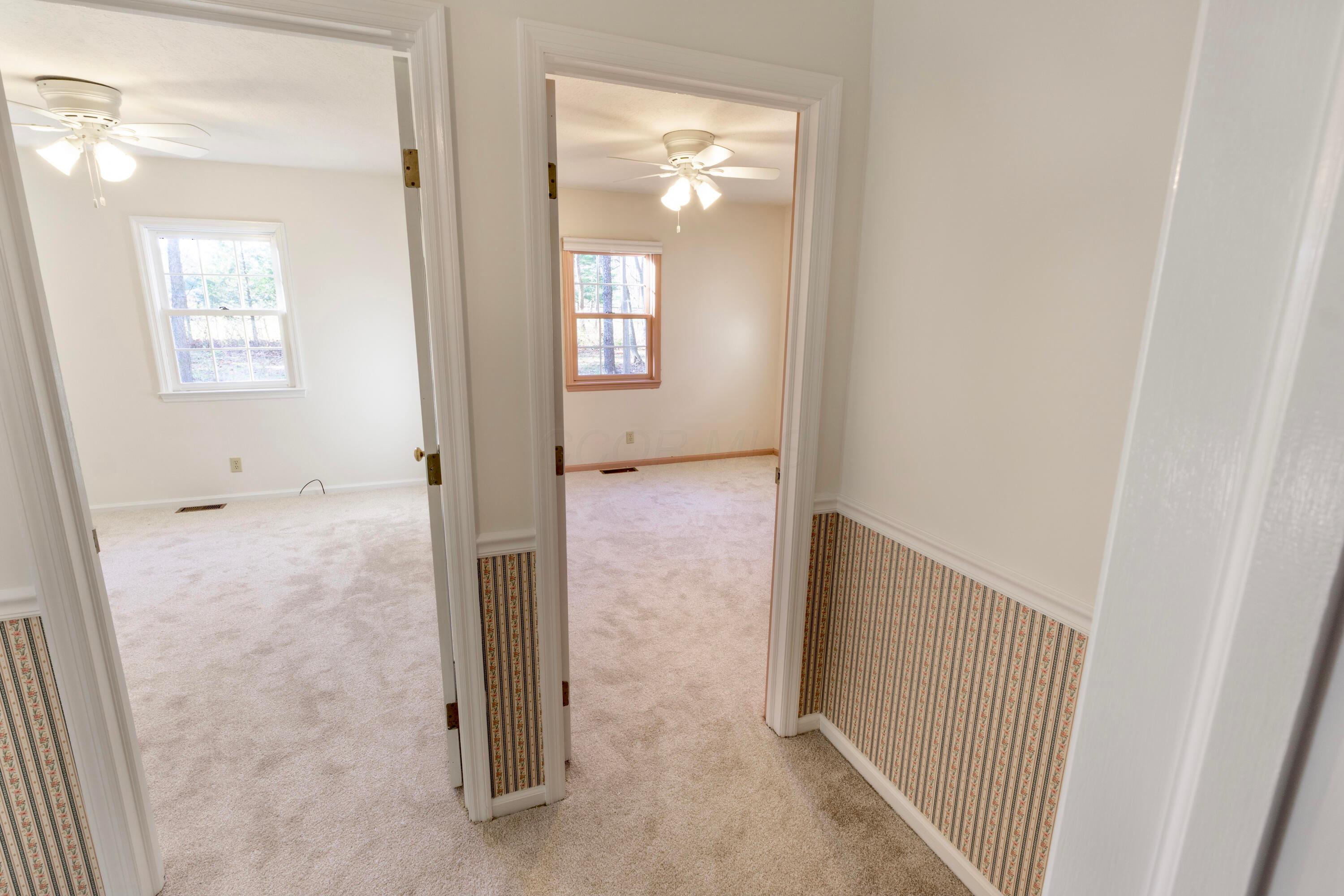3880 Fry Road Ostrander, OH 43061 - Photo 40 of 82 A look into bedrooms 2 and 3.
