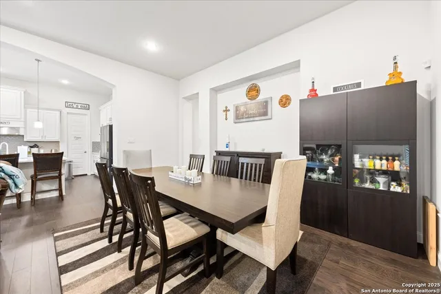 a view of a dining room with furniture