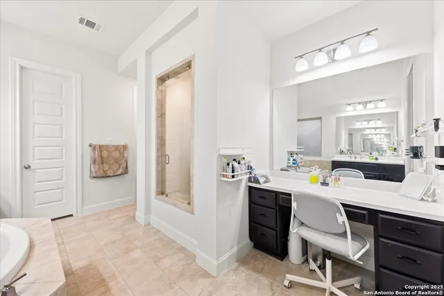 a room with a desk and chair