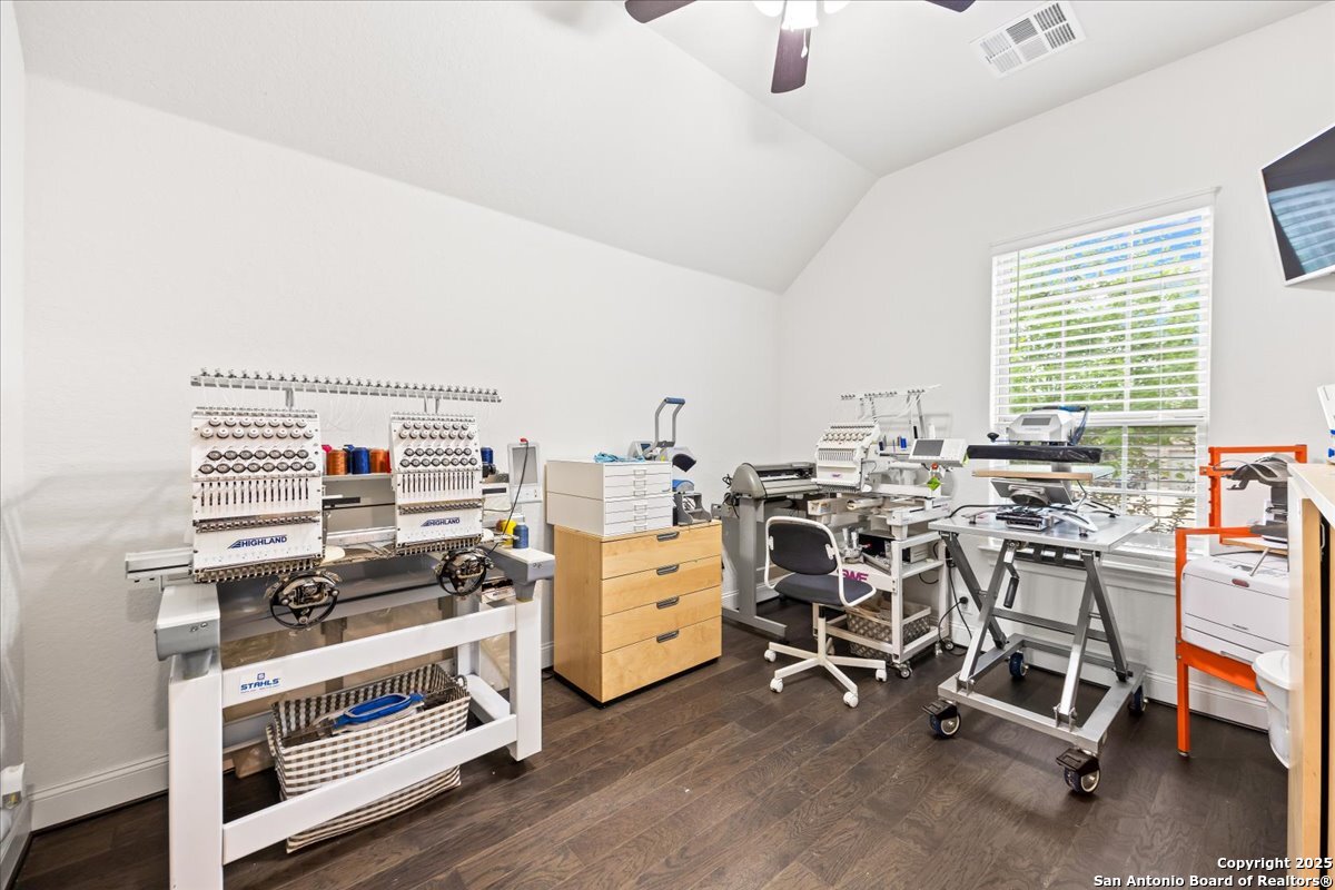 6957 Hallie Loop Schertz, TX 78154 - Photo 30 of 51 a view of a workspace with furniture and windows