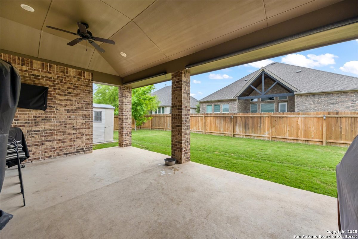 6957 Hallie Loop Schertz, TX 78154 - Photo 38 of 51 a view of a house with a yard