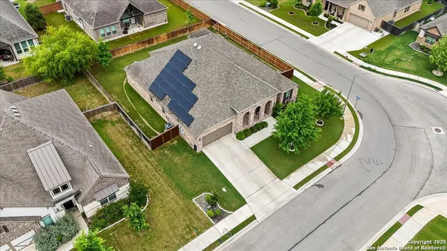 an aerial view of house yard and outdoor space