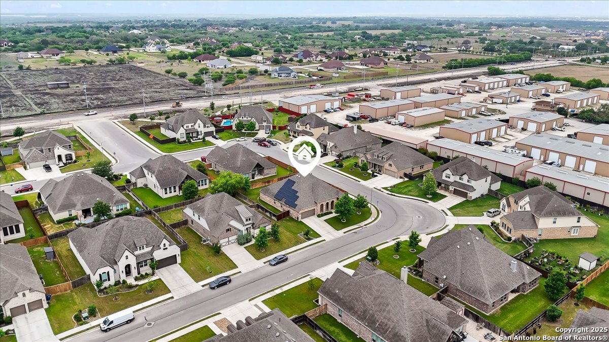 6957 Hallie Loop Schertz, TX 78154 - Photo 47 of 51 an aerial view of residential houses with outdoor space