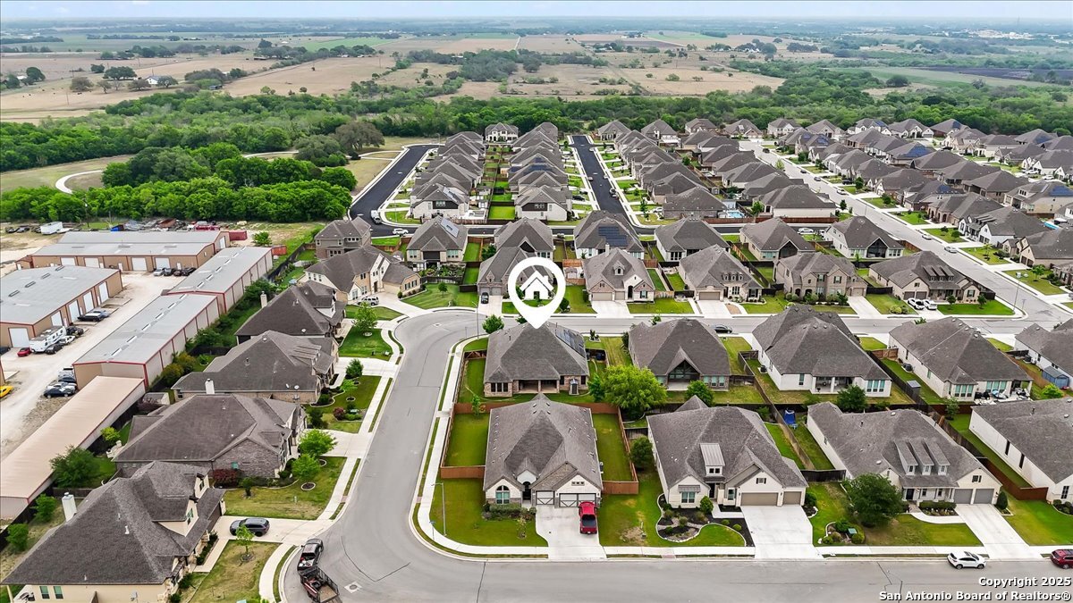 6957 Hallie Loop Schertz, TX 78154 - Photo 49 of 51 an aerial view of residential houses with outdoor space