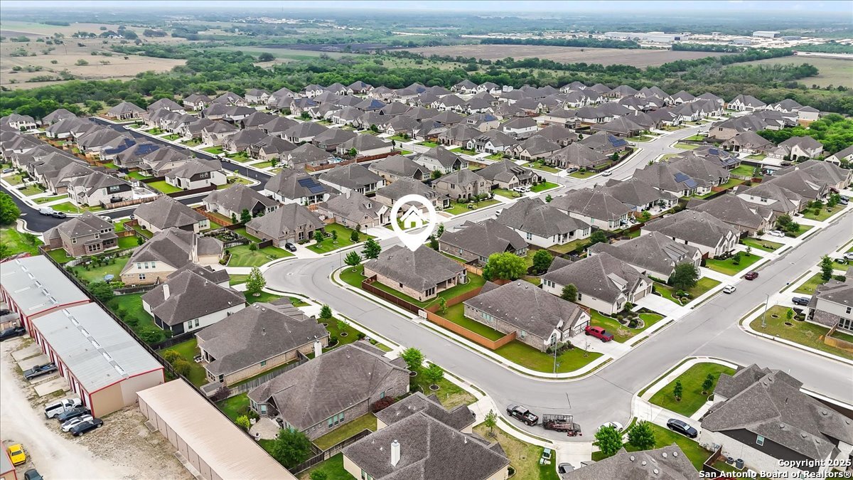 6957 Hallie Loop Schertz, TX 78154 - Photo 50 of 51 an aerial view of residential houses with outdoor space