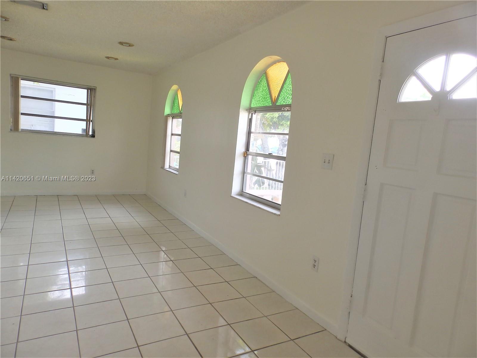 7442 Southwest 22nd Street, Unit 7442 Miami, FL 33155 - Photo 6 of 11 a view of room with window