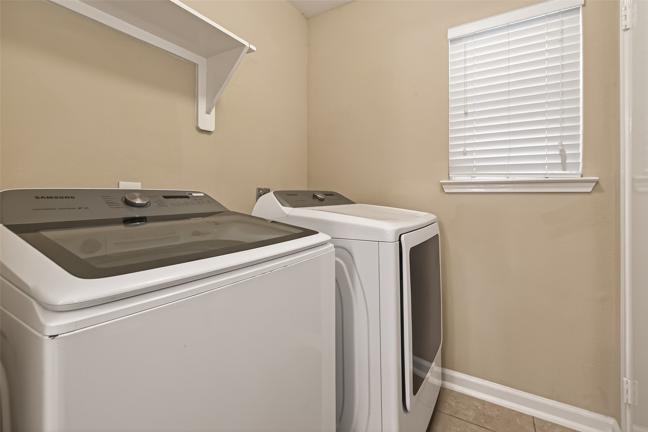 618 Bold Ruler Drive Stafford, TX 77477 - Photo 15 of 35 a utility room with dryer and washer