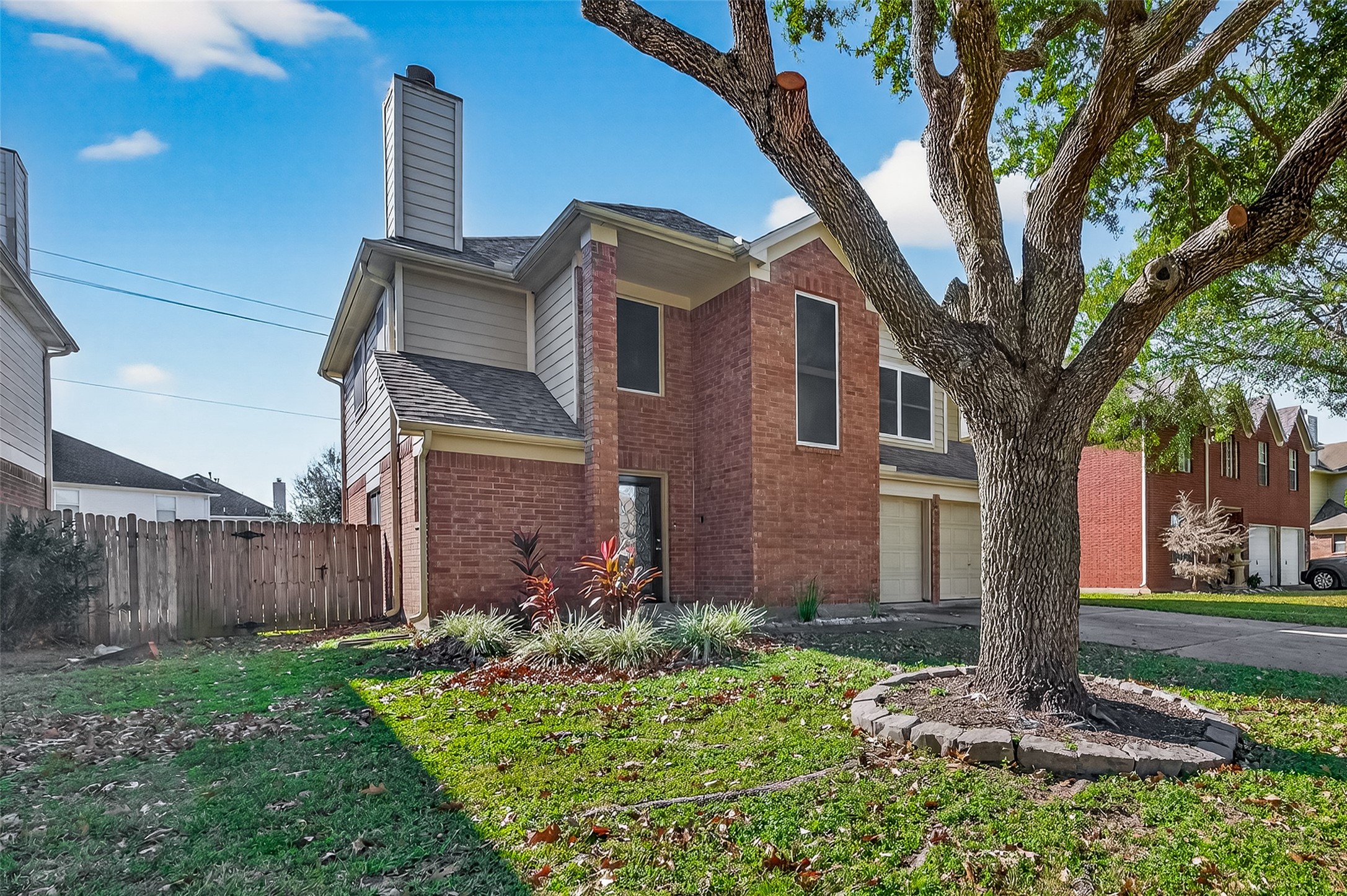 618 Bold Ruler Drive Stafford, TX 77477 - Photo 2 of 35 a front view of a house with garden
