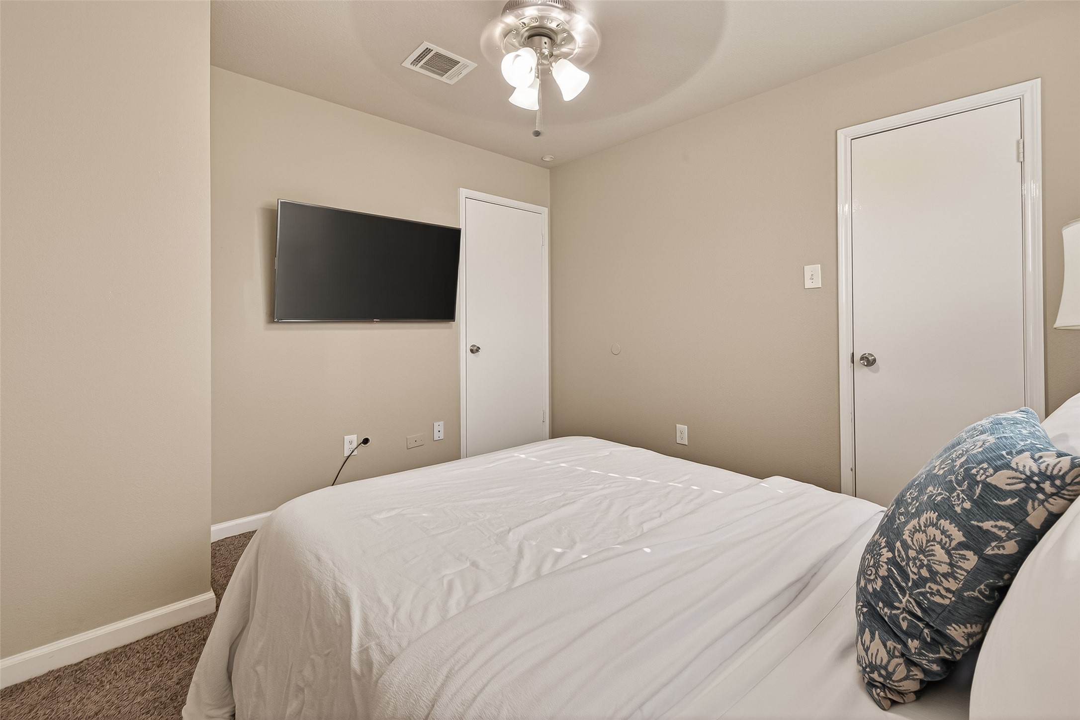 618 Bold Ruler Drive Stafford, TX 77477 - Photo 22 of 35 a bedroom with a bed and a flat screen tv