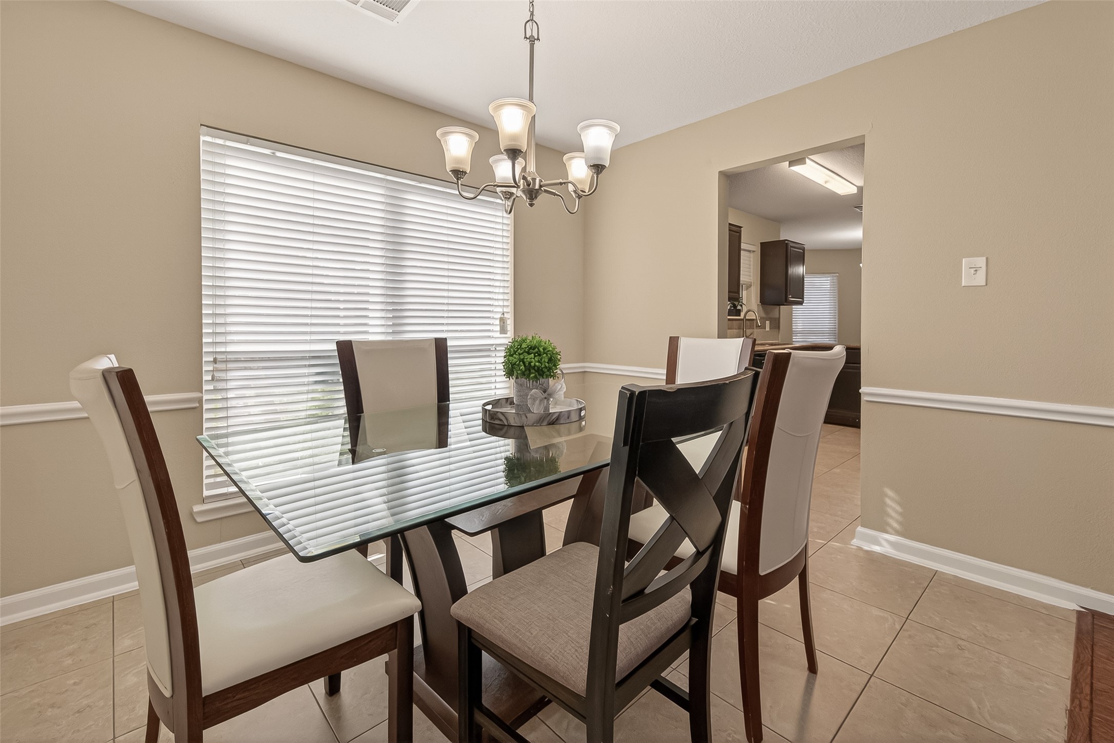 618 Bold Ruler Drive Stafford, TX 77477 - Photo 8 of 35 a view of a dining room with furniture and chandelier