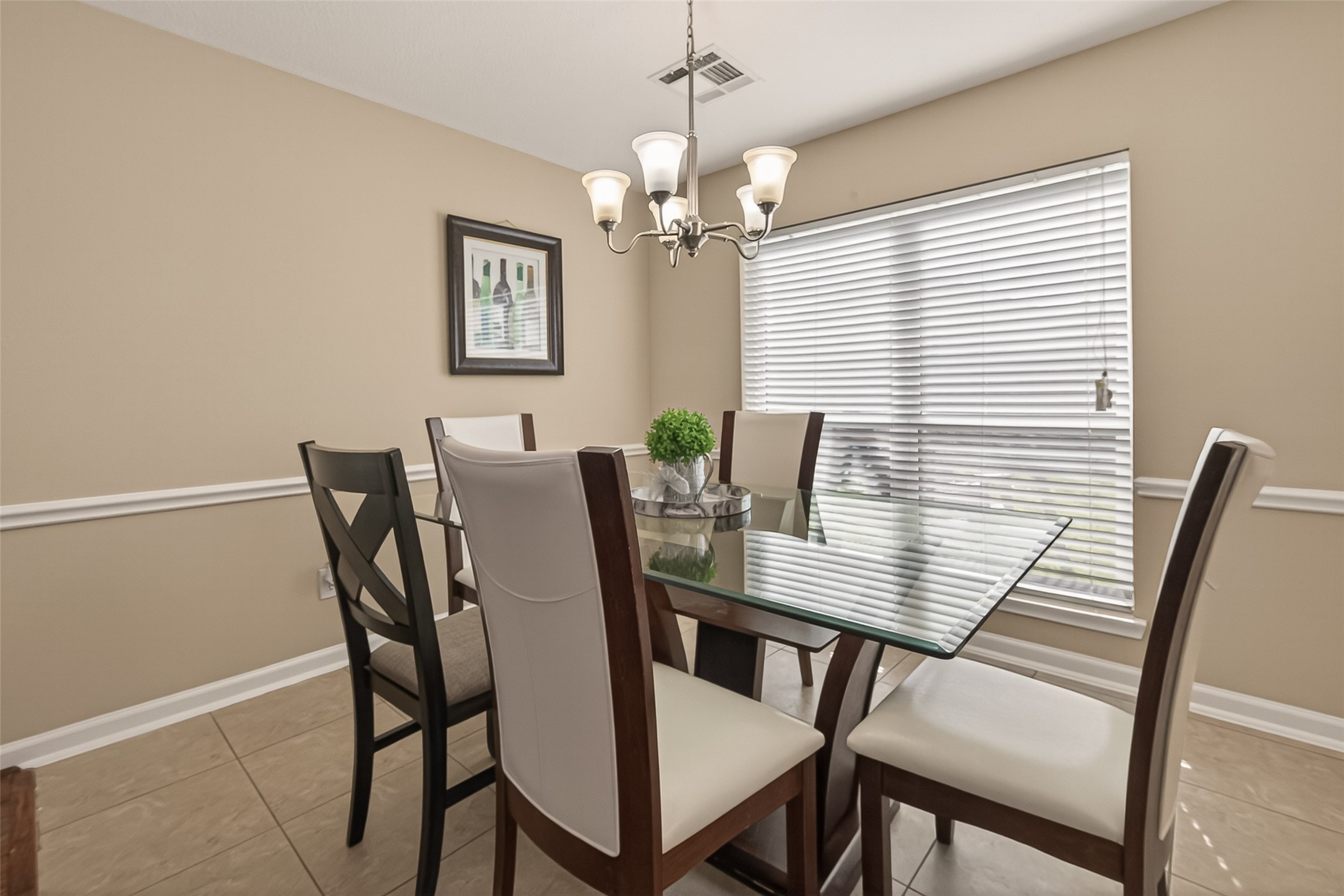 618 Bold Ruler Drive Stafford, TX 77477 - Photo 9 of 35 a view of a dining room with furniture and chandelier