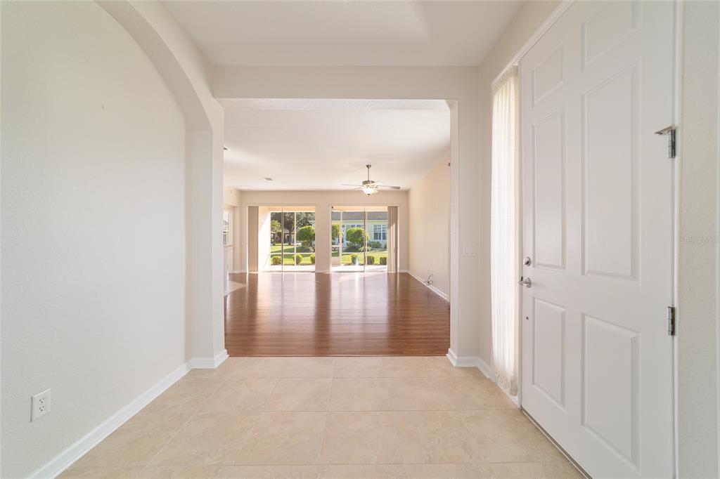 7153 Southwest 93rd Avenue Ocala, FL 34481 - Photo 11 of 61 an empty room with large windows and closet