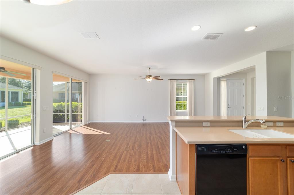 7153 Southwest 93rd Avenue Ocala, FL 34481 - Photo 21 of 61 an empty room with wooden floor and windows