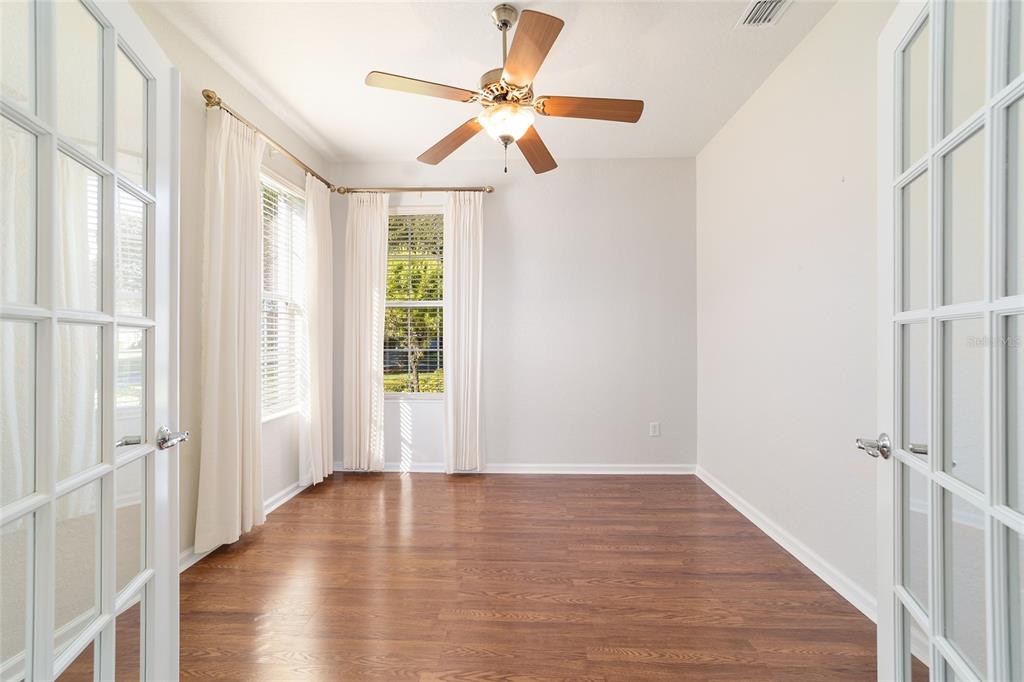 7153 Southwest 93rd Avenue Ocala, FL 34481 - Photo 34 of 61 a view of an entryway with wooden floor