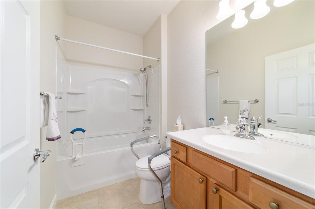 7153 Southwest 93rd Avenue Ocala, FL 34481 - Photo 38 of 61 a bathroom with a sink a toilet and shower