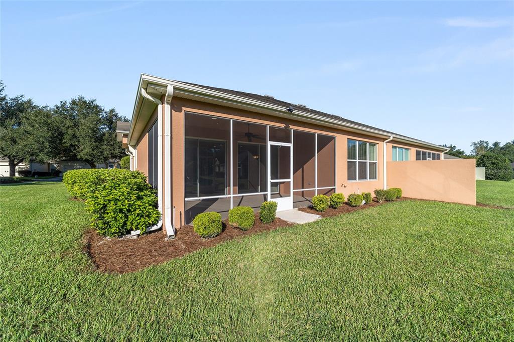 7153 Southwest 93rd Avenue Ocala, FL 34481 - Photo 44 of 61 a view of a house with backyard and porch