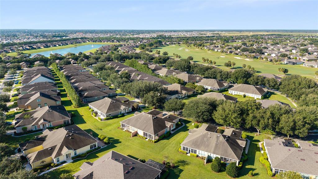 7153 Southwest 93rd Avenue Ocala, FL 34481 - Photo 47 of 61 an aerial view of residential houses with outdoor space