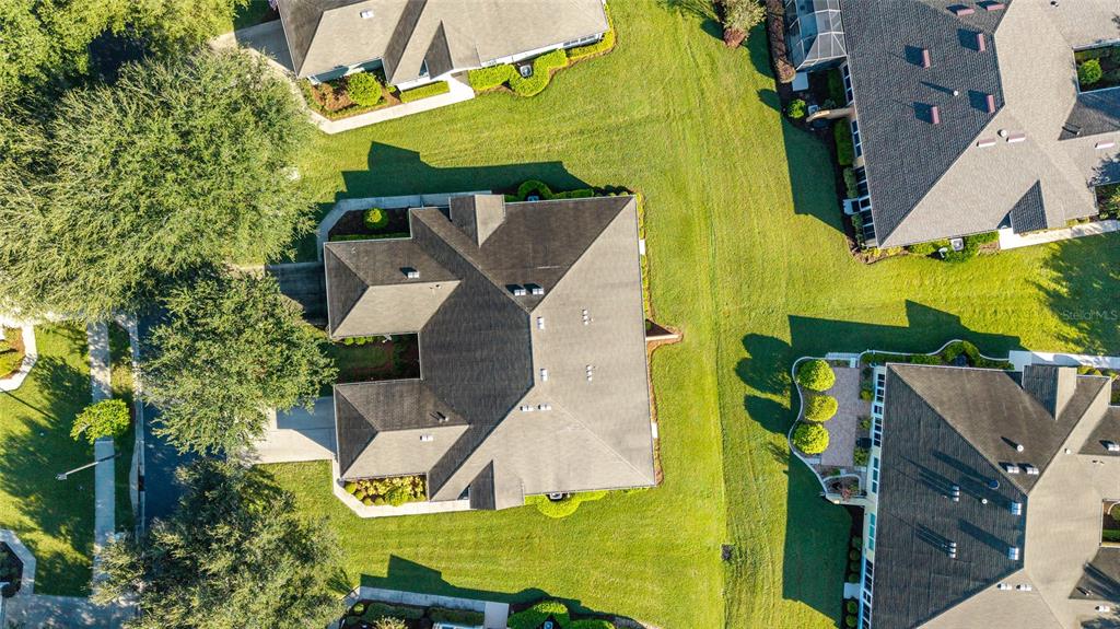 7153 Southwest 93rd Avenue Ocala, FL 34481 - Photo 48 of 61 an aerial view of a house with swimming pool