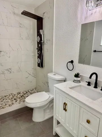 a house with trees in the background