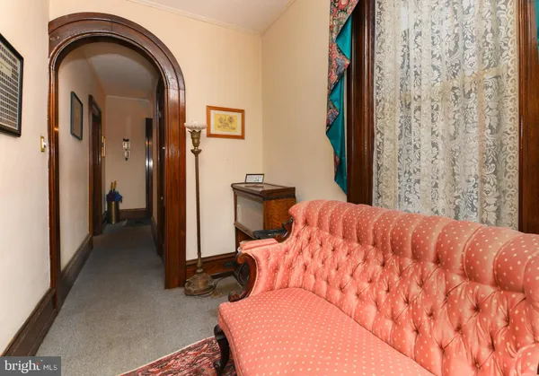 a balcony with furniture and a window