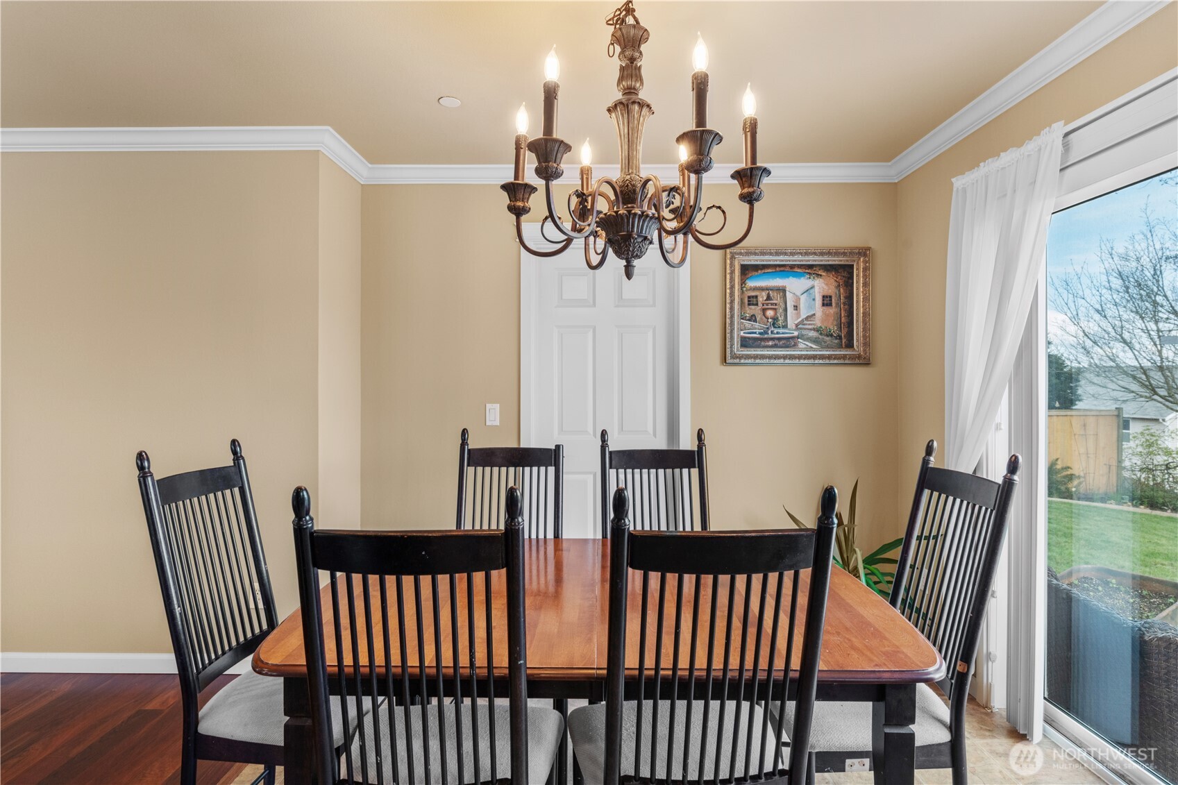 1375 Foreman Road DuPont, WA 98327 - Photo 13 of 30 a view of a dining room with furniture wooden floor and chandelier