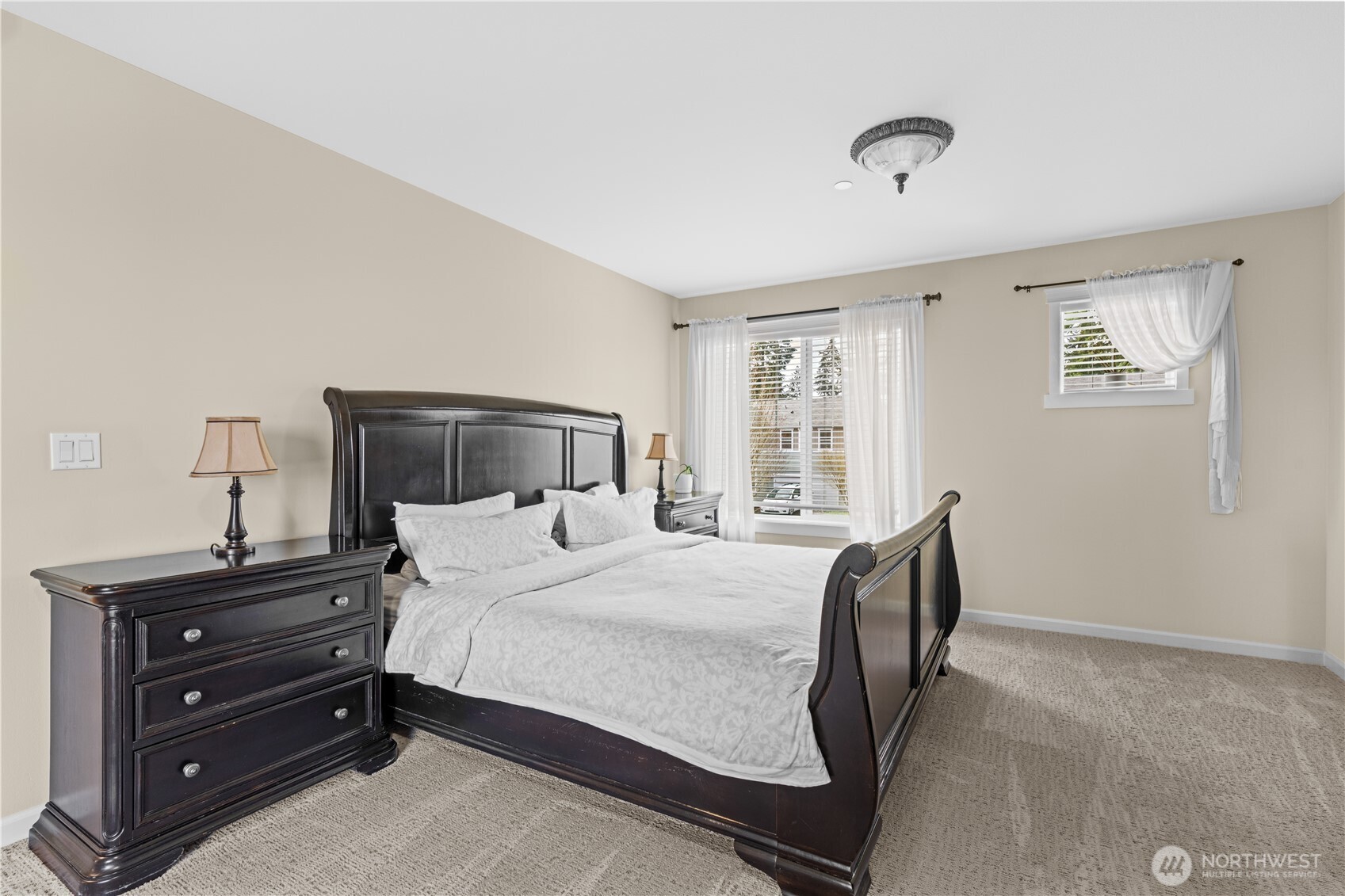 1375 Foreman Road DuPont, WA 98327 - Photo 23 of 30 a bedroom with a bed and wooden floor