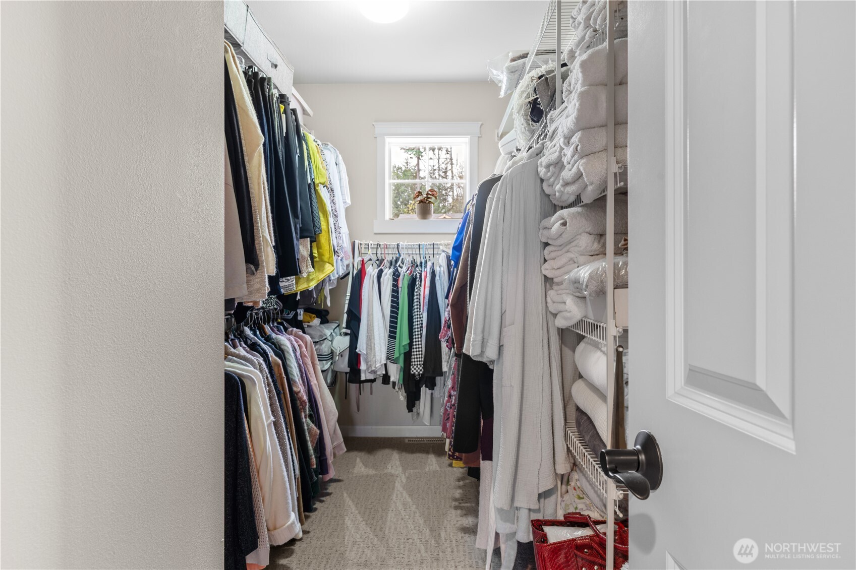 1375 Foreman Road DuPont, WA 98327 - Photo 24 of 30 a view of walk in closet with clothes
