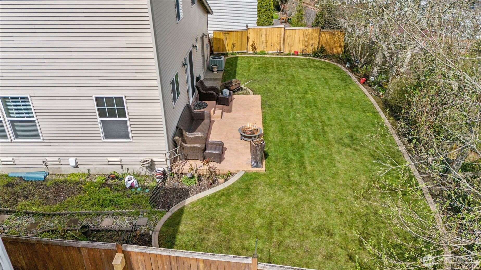 1375 Foreman Road DuPont, WA 98327 - Photo 27 of 30 a backyard of a house with lots of green space