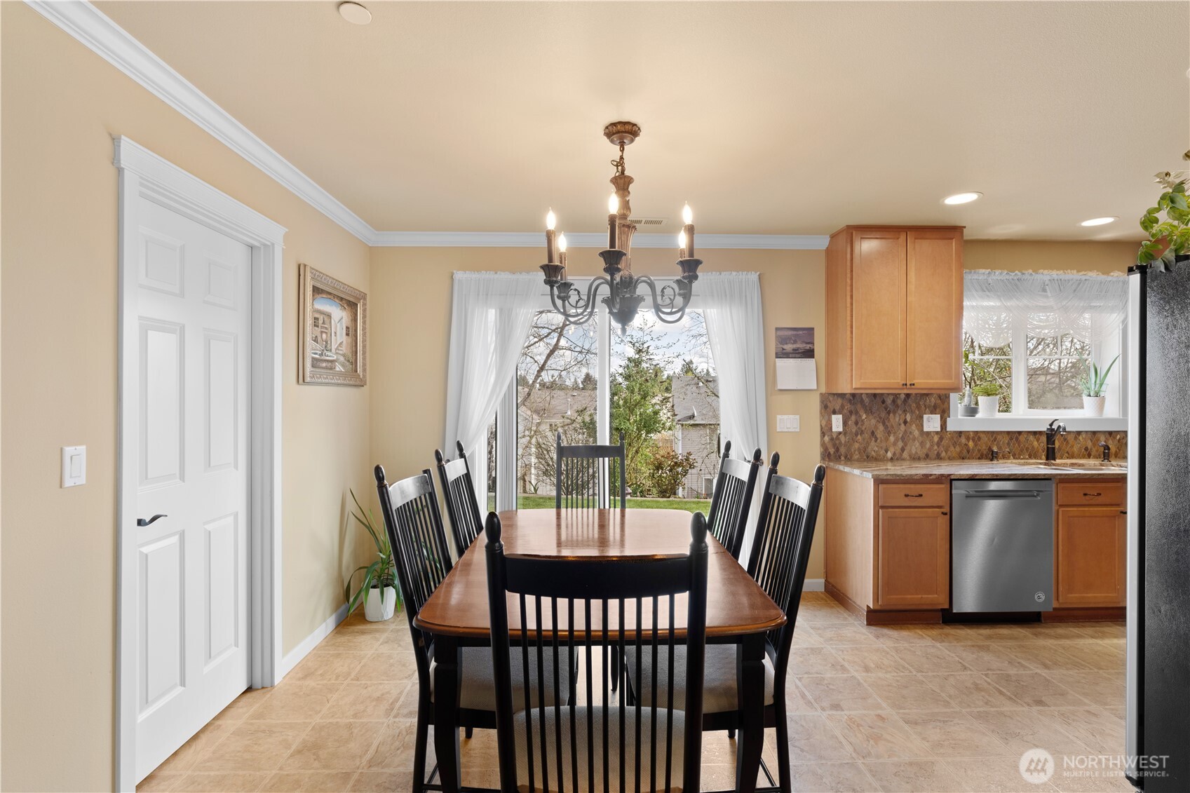 1375 Foreman Road DuPont, WA 98327 - Photo 9 of 30 a view of a dining room with furniture window and outside view
