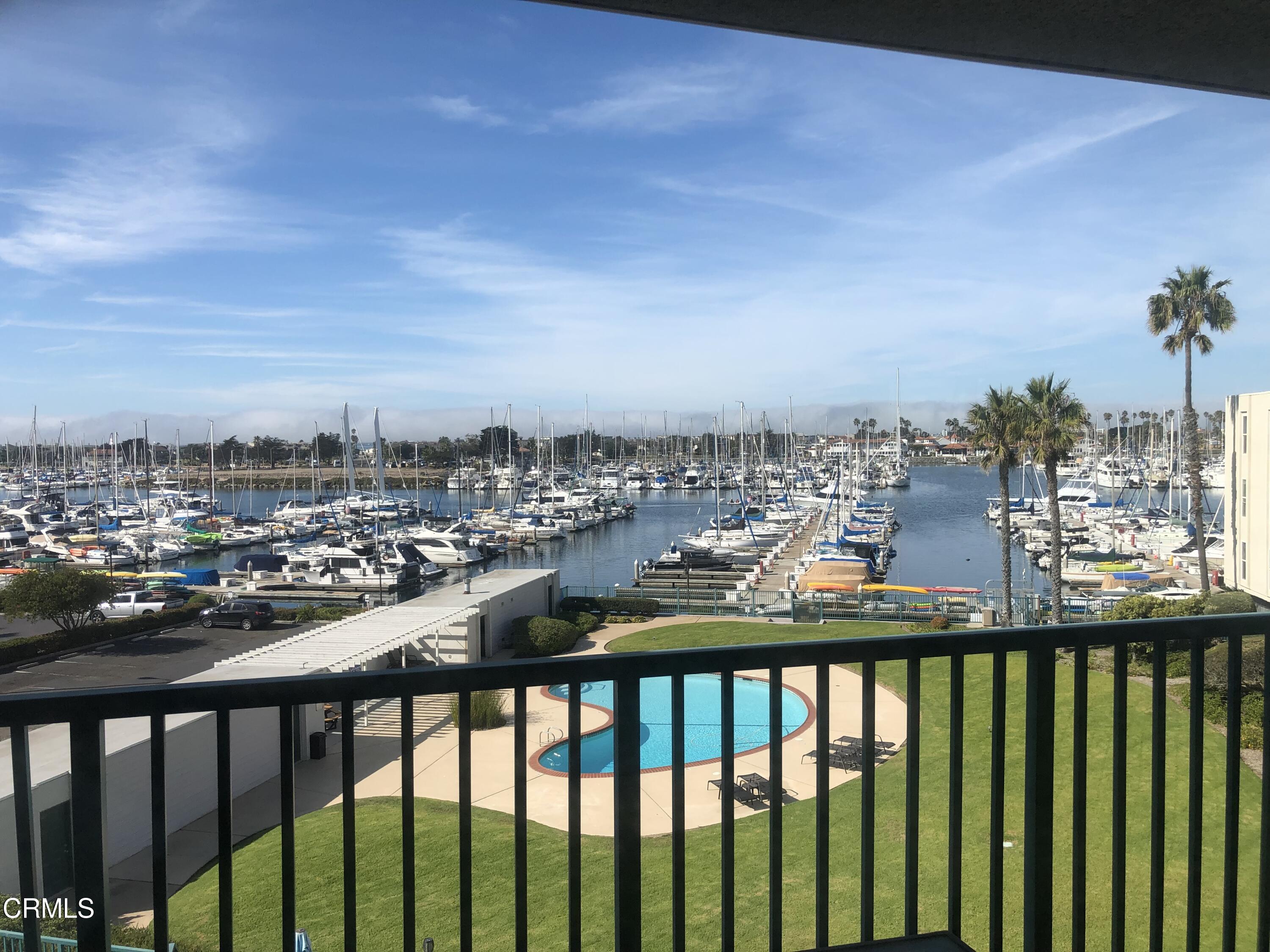 a view of a balcony with city view