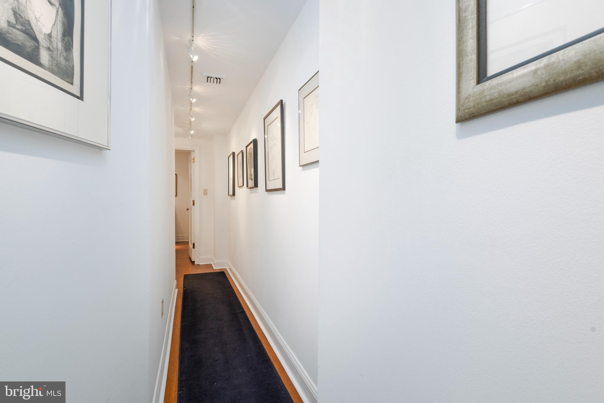 1901 Walnut Street, Unit 15B Philadelphia, PA 19103 - Photo 17 of 36 a view of a hallway with entryway