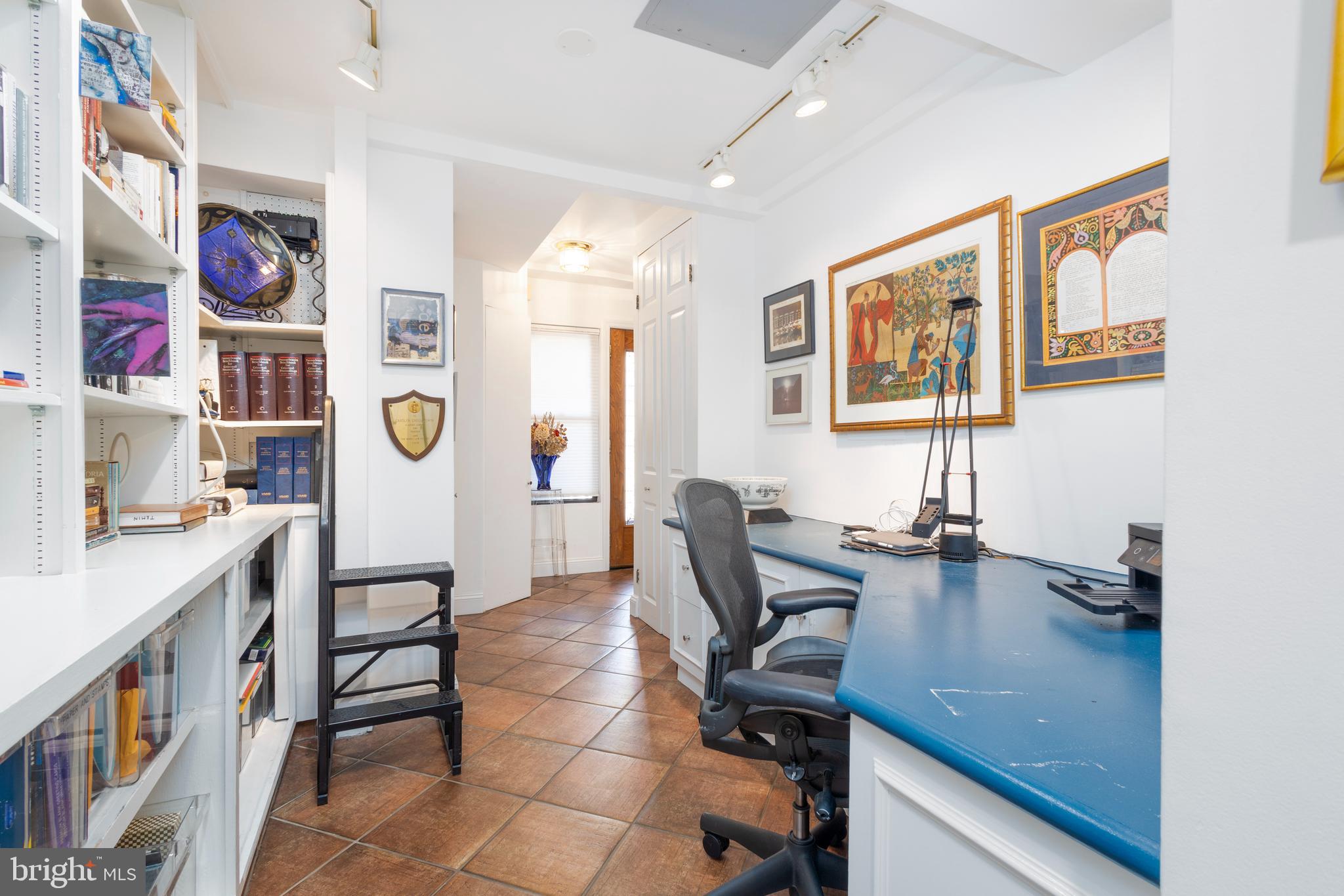 1901 Walnut Street, Unit 15B Philadelphia, PA 19103 - Photo 8 of 36 a view of a workspace with furniture and toys