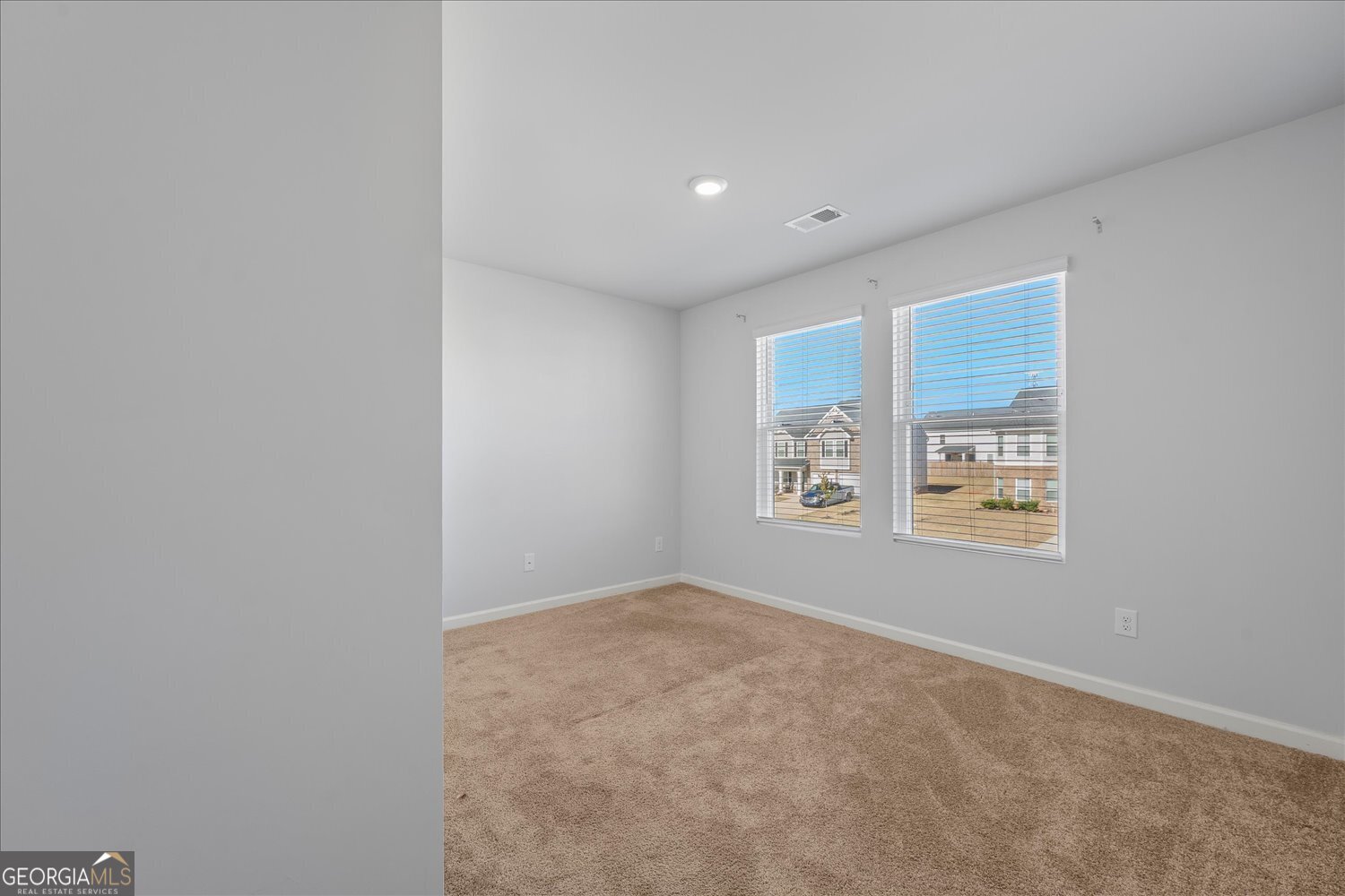 89 Cowpen Court Covington, GA 30014 - Photo 20 of 44 an empty room with windows