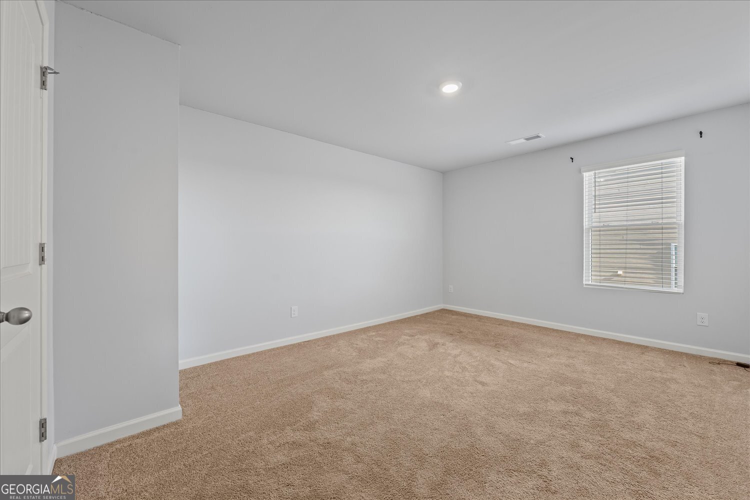 89 Cowpen Court Covington, GA 30014 - Photo 25 of 44 an empty room with windows