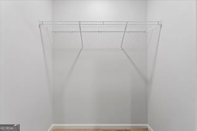 a view of a room with racks on the wall