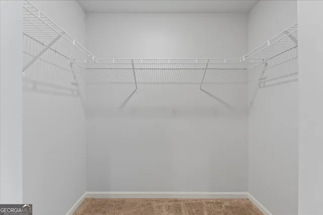 a view of a room with racks on the wall