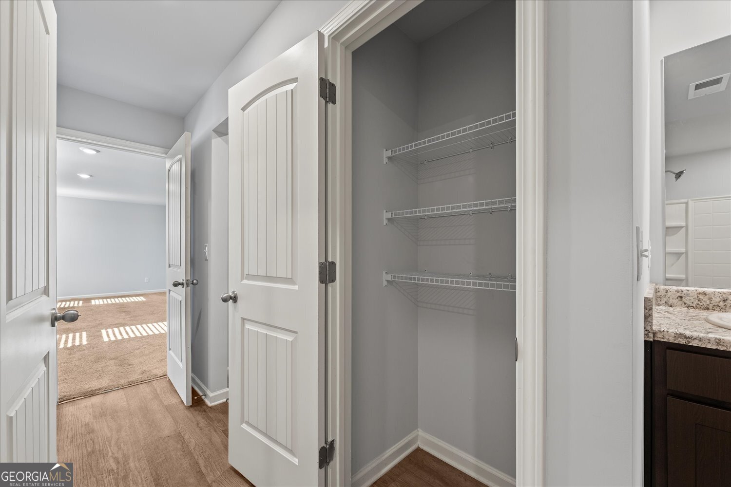 89 Cowpen Court Covington, GA 30014 - Photo 33 of 44 a view of bathroom with a sink and mirror