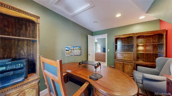 a room with furniture and wooden floor