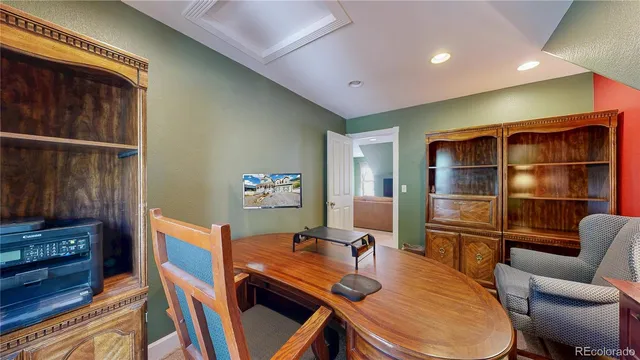 a room with furniture and wooden floor