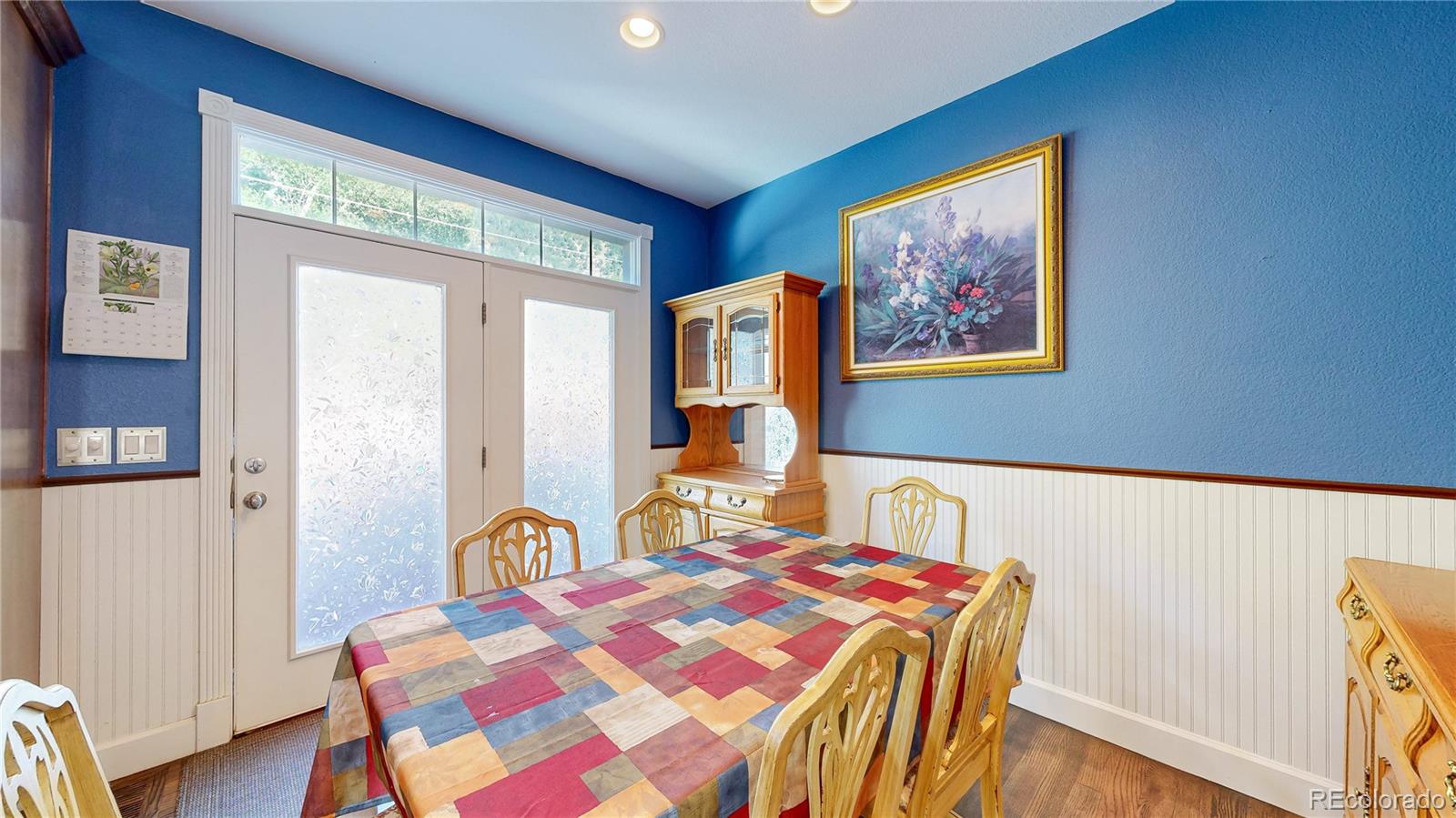 1431 Marion Street Georgetown, CO 80444 - Photo 36 of 50 a bedroom with a bed and a painting on the wall